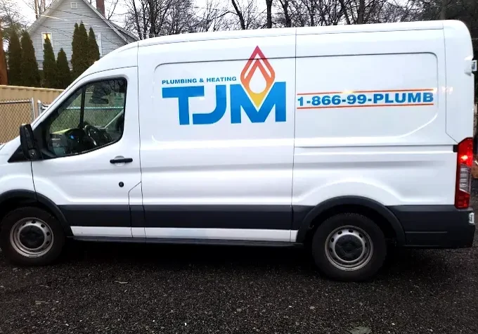 TJM Plumbing & Heating service van